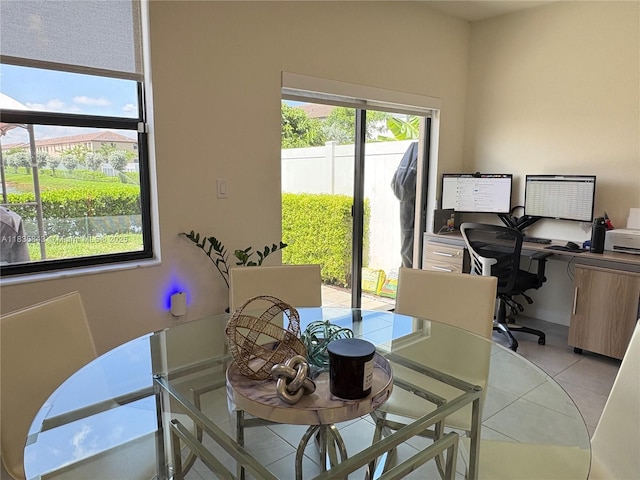 3482 114th Ter, Hialeah, FL 33018 - dining room featuring light tile patterned floors and a desk