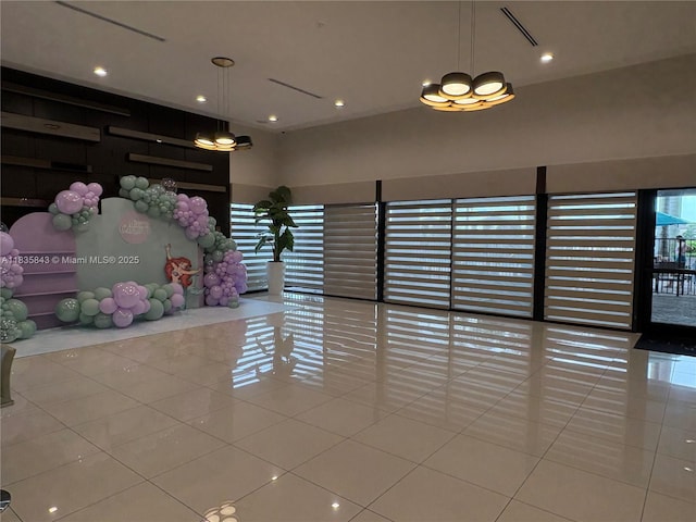 3482 114th Ter, Hialeah, FL 33018 - tiled spare room with recessed lighting