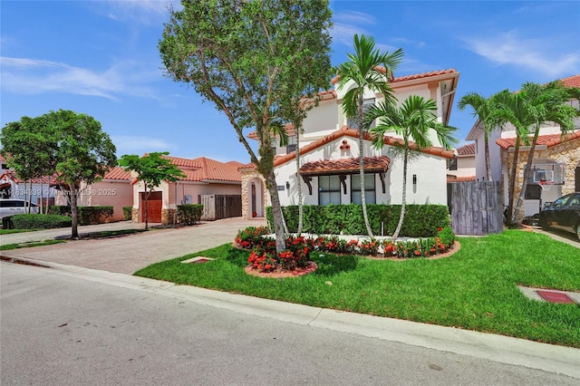 1007 NW 99th Ct, Miami, FL 33172 - mediterranean / spanish home featuring stucco siding, a tiled roof, and driveway