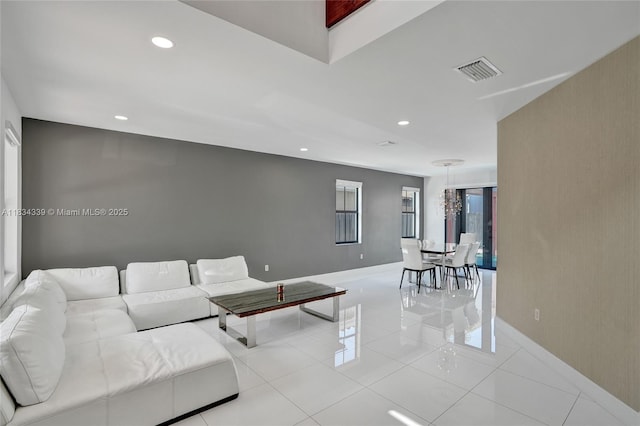 1007 NW 99th Ct, Miami, FL 33172 - living room with recessed lighting and light tile patterned floors