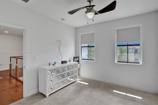 1007 NW 99th Ct, Miami, FL 33172 - carpeted bedroom with baseboards and a ceiling fan