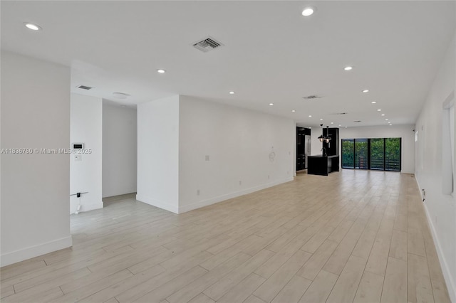 120 NW 41st St, Miami, FL 33127 - unfurnished room featuring light wood-type flooring and recessed lighting