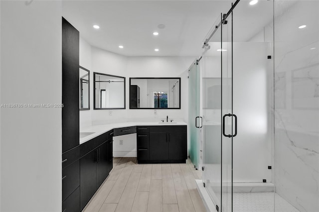 120 NW 41st St, Miami, FL 33127 - bathroom with double vanity, recessed lighting, and a stall shower