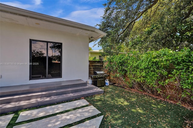 120 NW 41st St, Miami, FL 33127 - view of green lawn featuring entry steps