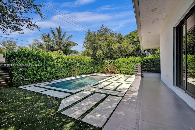 120 NW 41st St, Miami, FL 33127 - view of pool featuring a patio and a fenced backyard