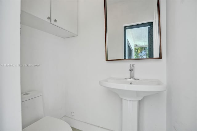 120 NW 41st St, Miami, FL 33127 - half bath with toilet and a sink