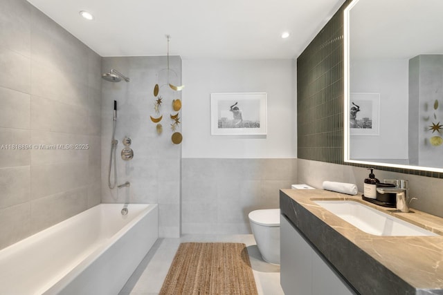 500 Alton Rd Unit 4004, Miami Beach, FL 33139 - full bath featuring tile walls, vanity, tub / shower combination, recessed lighting, and tile patterned flooring