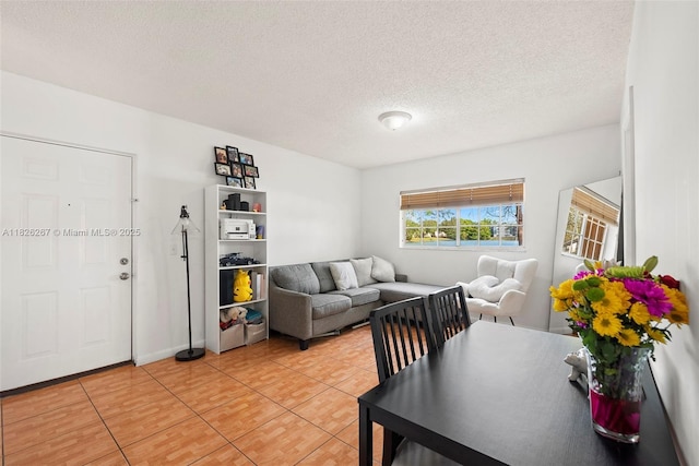 3660 N 56th Ave Unit 602, Hollywood, FL 33021 - living room with light tile patterned floors and a textured ceiling