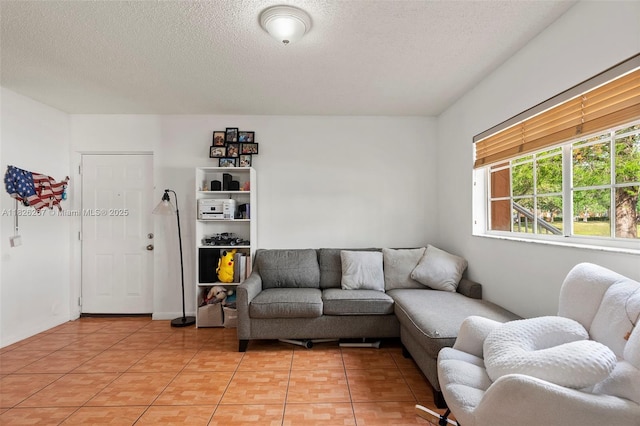 3660 N 56th Ave Unit 602, Hollywood, FL 33021 - living area featuring a textured ceiling and light tile patterned floors