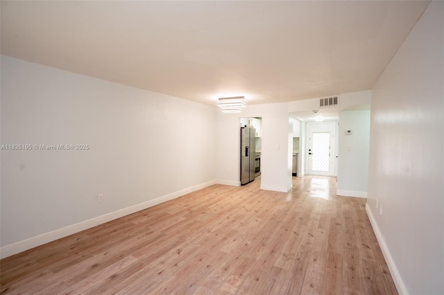 2780 N Pine Island Rd Unit 211, Sunrise, FL 33322 - unfurnished room featuring light wood finished floors and baseboards