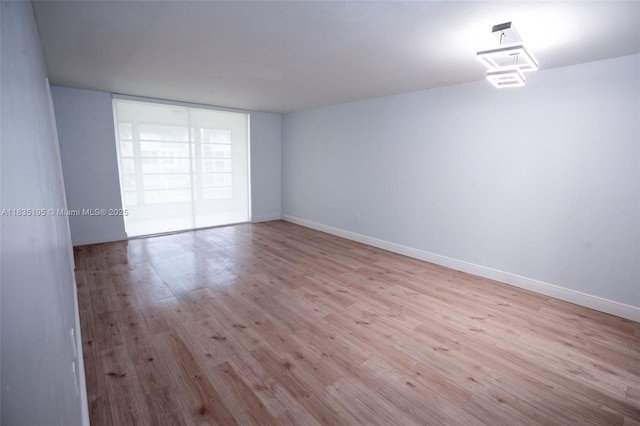 2780 N Pine Island Rd Unit 211, Sunrise, FL 33322 - unfurnished room with wood finished floors