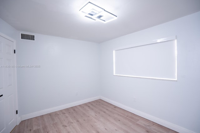 2780 N Pine Island Rd Unit 211, Sunrise, FL 33322 - unfurnished room with wood finished floors and baseboards