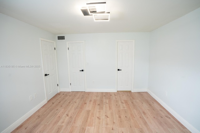 2780 N Pine Island Rd Unit 211, Sunrise, FL 33322 - unfurnished room with light wood-style floors and baseboards