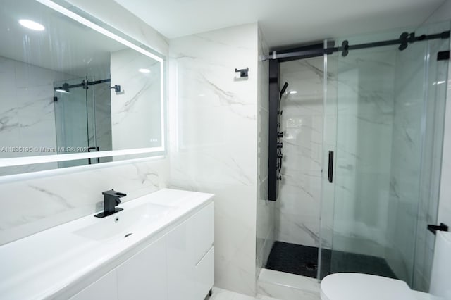 2780 N Pine Island Rd Unit 211, Sunrise, FL 33322 - bathroom featuring a marble finish shower, vanity, and tile walls