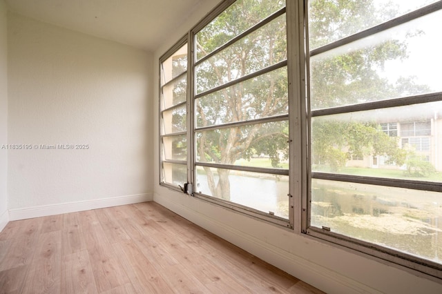 2780 N Pine Island Rd Unit 211, Sunrise, FL 33322 - unfurnished sunroom featuring a water view