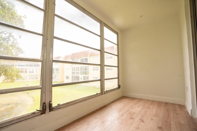 2780 N Pine Island Rd Unit 211, Sunrise, FL 33322 - unfurnished sunroom with plenty of natural light