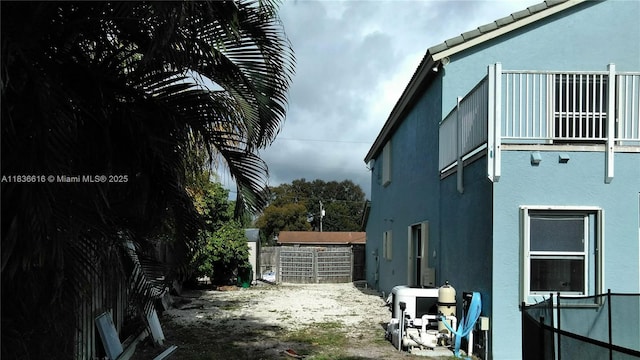 170 NE Dominican Ter, Port St Lucie, FL 34983 - view of side of property with stucco siding