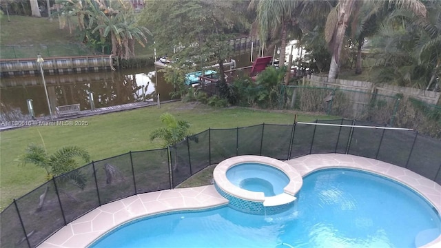 170 NE Dominican Ter, Port St Lucie, FL 34983 - view of swimming pool featuring a pool with connected hot tub and a water view