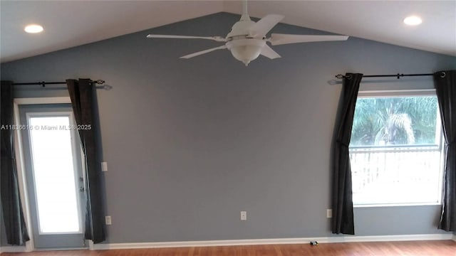 170 NE Dominican Ter, Port St Lucie, FL 34983 - spare room with lofted ceiling, ceiling fan, wood finished floors, and recessed lighting