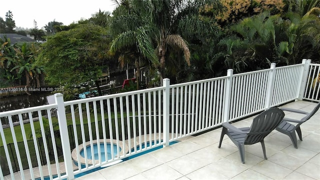 170 NE Dominican Ter, Port St Lucie, FL 34983 - balcony with a jacuzzi and view of pool area