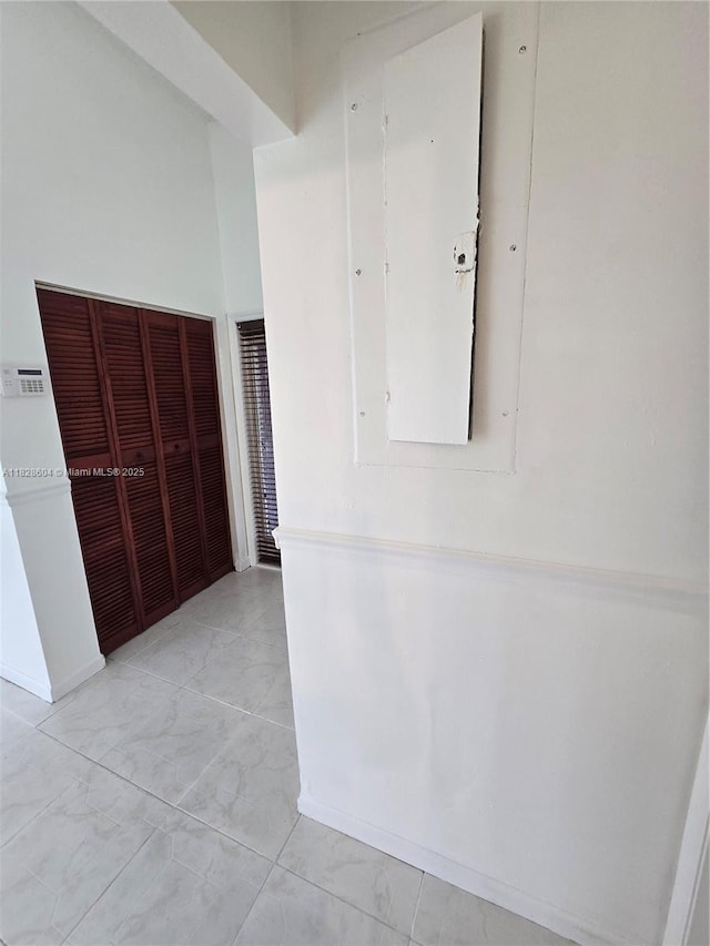 13567 SW 286th Ter, Homestead, FL 33033 - corridor featuring light marble finish floors and baseboards