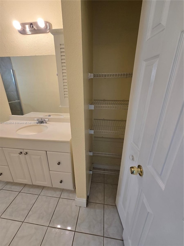 13567 SW 286th Ter, Homestead, FL 33033 - bathroom with vanity and tile patterned floors