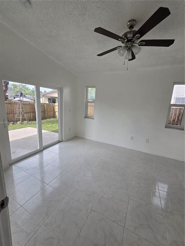 13567 SW 286th Ter, Homestead, FL 33033 - unfurnished room with a textured ceiling and a ceiling fan