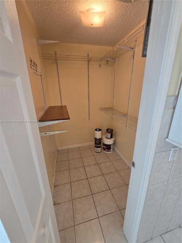 13567 SW 286th Ter, Homestead, FL 33033 - walk in closet featuring light tile patterned flooring