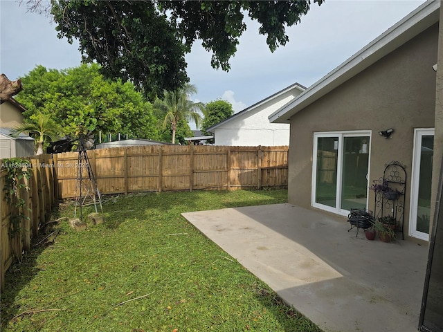 13567 SW 286th Ter, Homestead, FL 33033 - fenced backyard with a patio area
