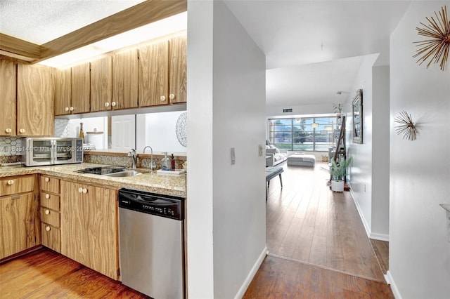 1532 Whitehall Dr Unit 202, Davie, FL 33324 - kitchen featuring dishwasher, backsplash, and wood finished floors