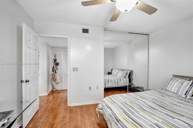 1532 Whitehall Dr Unit 202, Davie, FL 33324 - bedroom featuring light wood-type flooring, a closet, and ceiling fan