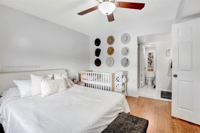 1532 Whitehall Dr Unit 202, Davie, FL 33324 - bedroom featuring wood-type flooring and ceiling fan