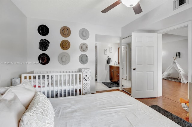 1532 Whitehall Dr Unit 202, Davie, FL 33324 - bedroom featuring wood finished floors and ceiling fan