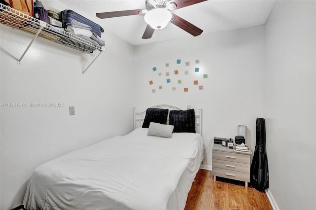 1532 Whitehall Dr Unit 202, Davie, FL 33324 - bedroom featuring wood finished floors and a ceiling fan