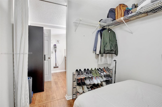 1532 Whitehall Dr Unit 202, Davie, FL 33324 - walk in closet with wood finished floors