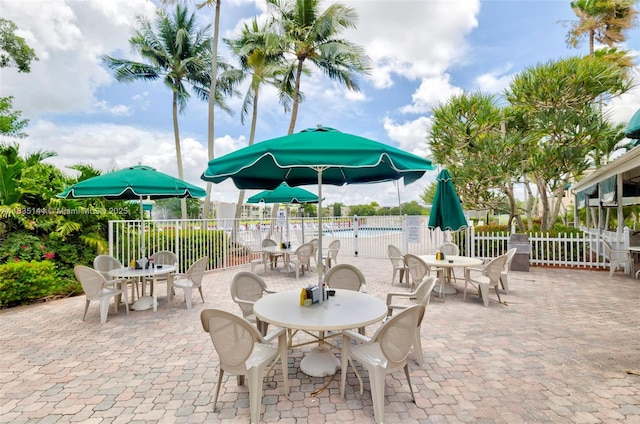 1532 Whitehall Dr Unit 202, Davie, FL 33324 - view of patio / terrace featuring outdoor dining area