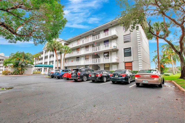 1532 Whitehall Dr Unit 202, Davie, FL 33324 - view of apartment building / complex featuring uncovered parking