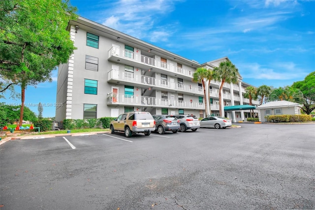 1532 Whitehall Dr Unit 202, Davie, FL 33324 - view of apartment building / complex featuring uncovered parking