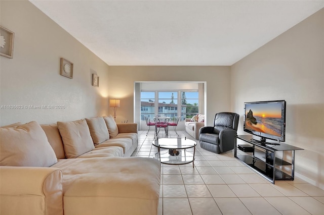 4805 NW 35th St Unit 603, Lauderdale Lakes, FL 33319 - living area with light tile patterned floors