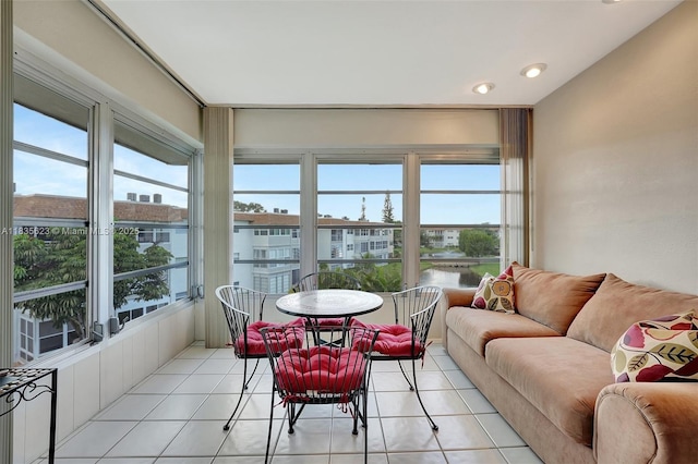 4805 NW 35th St Unit 603, Lauderdale Lakes, FL 33319 - sunroom featuring healthy amount of natural light, tile patterned flooring, recessed lighting, and a water view