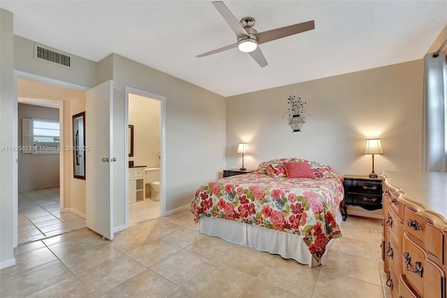 4805 NW 35th St Unit 603, Lauderdale Lakes, FL 33319 - bedroom featuring light tile patterned flooring, ensuite bathroom, and a ceiling fan