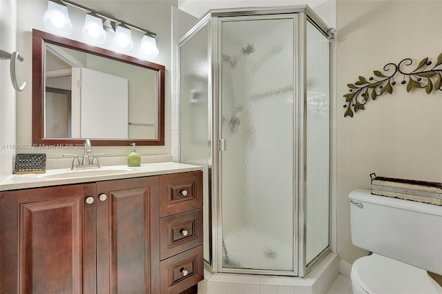 4805 NW 35th St Unit 603, Lauderdale Lakes, FL 33319 - bathroom featuring a shower stall, vanity, and tile patterned flooring