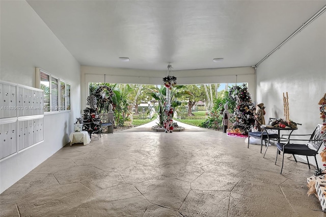 4805 NW 35th St Unit 603, Lauderdale Lakes, FL 33319 - unfurnished sunroom featuring mail area