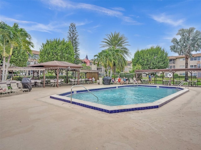 4805 NW 35th St Unit 603, Lauderdale Lakes, FL 33319 - community pool with a patio area and a gazebo