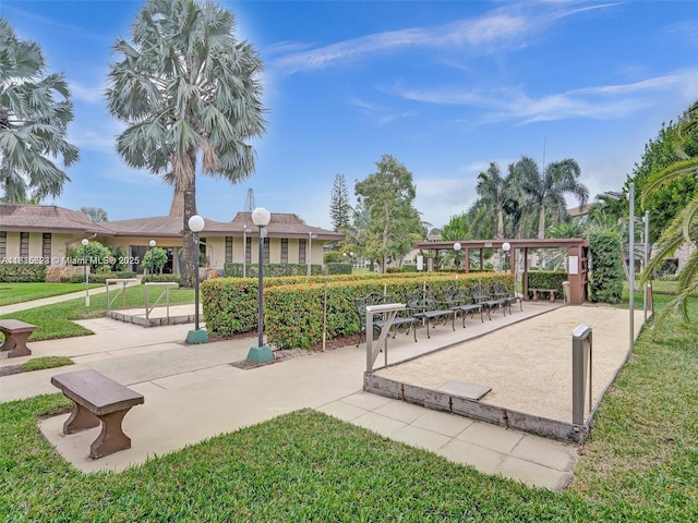 4805 NW 35th St Unit 603, Lauderdale Lakes, FL 33319 - view of community featuring a yard