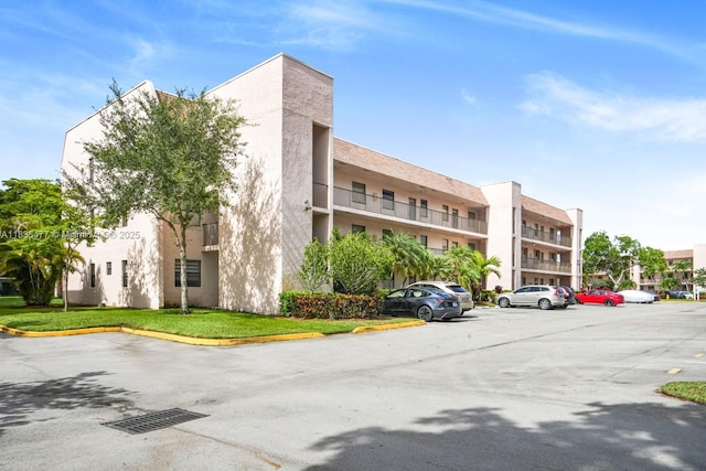 10332 Sunrise Lakes Blvd Unit 206, Sunrise, FL 33322 - view of property with uncovered parking