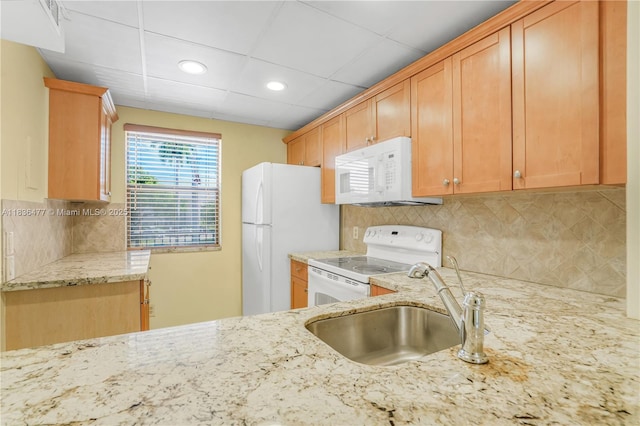 10332 Sunrise Lakes Blvd Unit 206, Sunrise, FL 33322 - kitchen featuring white appliances, light stone counters, decorative backsplash, and recessed lighting