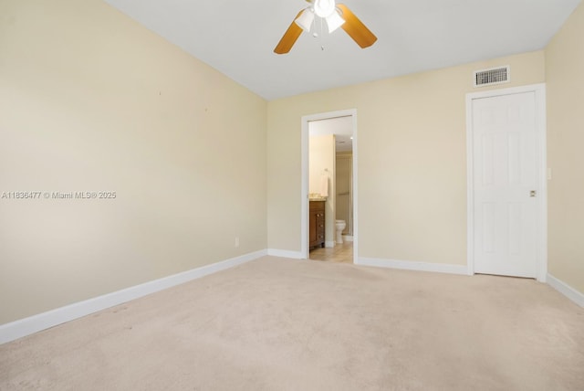 10332 Sunrise Lakes Blvd Unit 206, Sunrise, FL 33322 - unfurnished bedroom with light carpet, connected bathroom, and ceiling fan