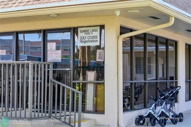 10332 Sunrise Lakes Blvd Unit 206, Sunrise, FL 33322 - entrance to property with roof with shingles