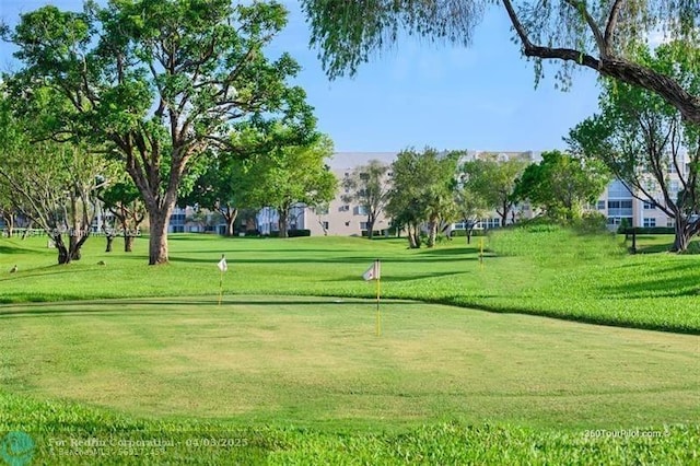 10332 Sunrise Lakes Blvd Unit 206, Sunrise, FL 33322 - surrounding community featuring a lawn